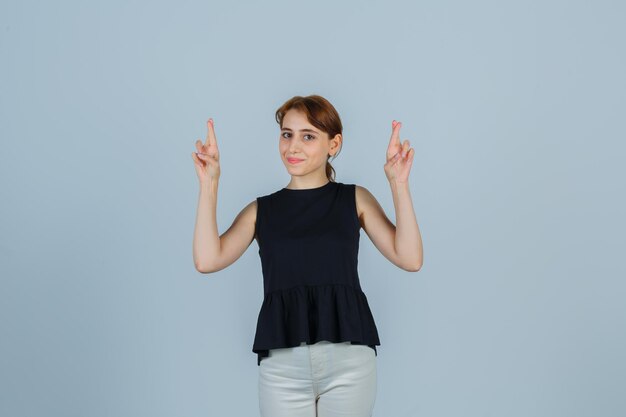 Expressive young lady posing in the studio