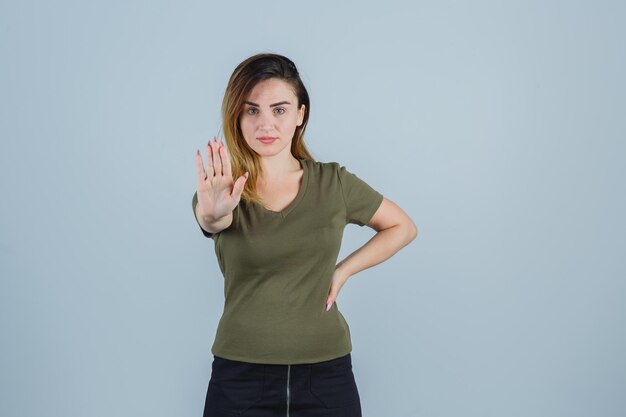 Expressive young lady posing in the studio