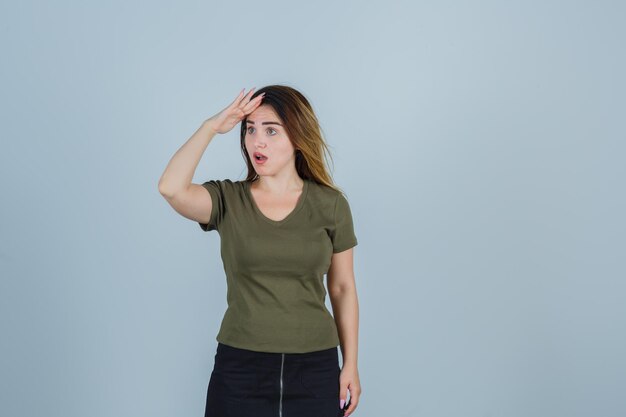 Expressive young lady posing in the studio