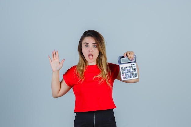 Expressive young lady posing in the studio