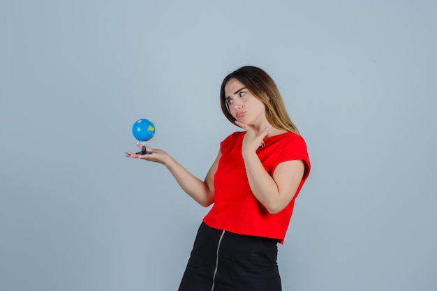 Expressive young lady posing in the studio