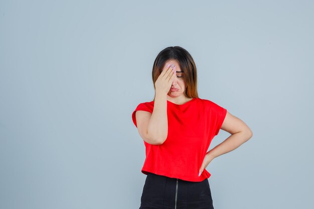 Expressive young lady posing in the studio