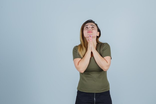 Expressive young lady posing in the studio