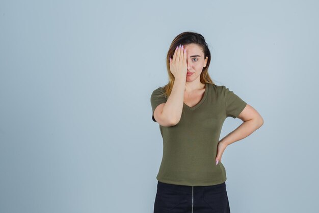 Expressive young lady posing in the studio