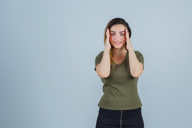 Expressive young lady posing in the studio