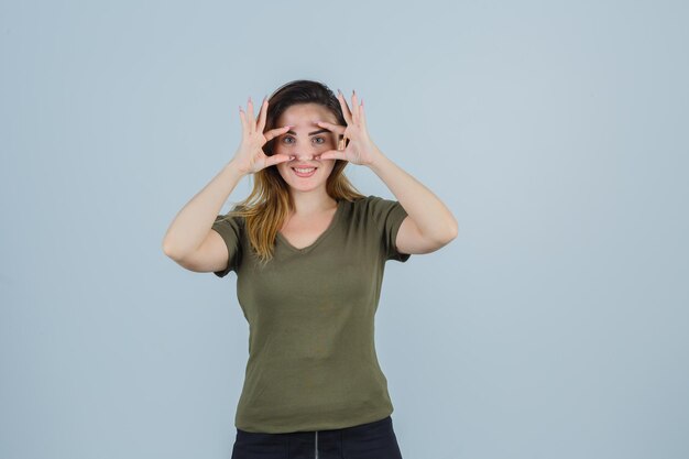 Expressive young lady posing in the studio