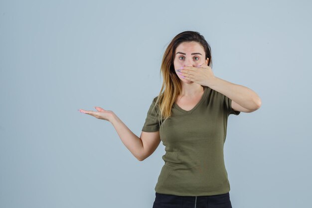 Expressive young lady posing in the studio