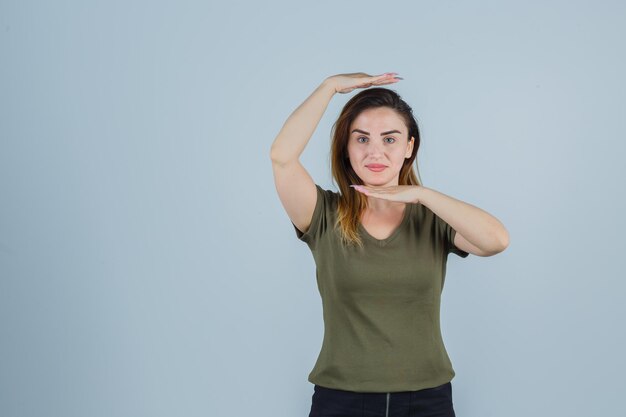 Expressive young lady posing in the studio