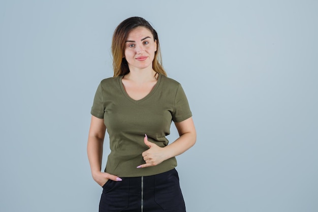 Expressive young lady posing in the studio