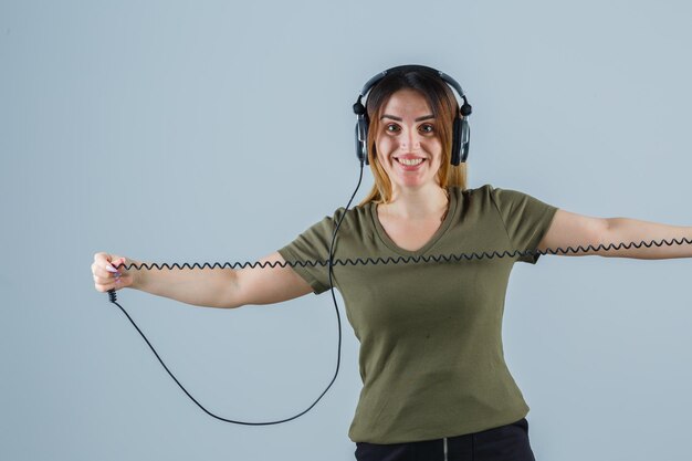 Expressive young lady posing in the studio