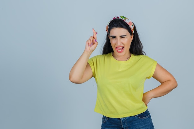 Expressive young lady posing in the studio