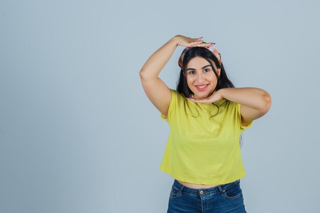 Expressive young lady posing in the studio