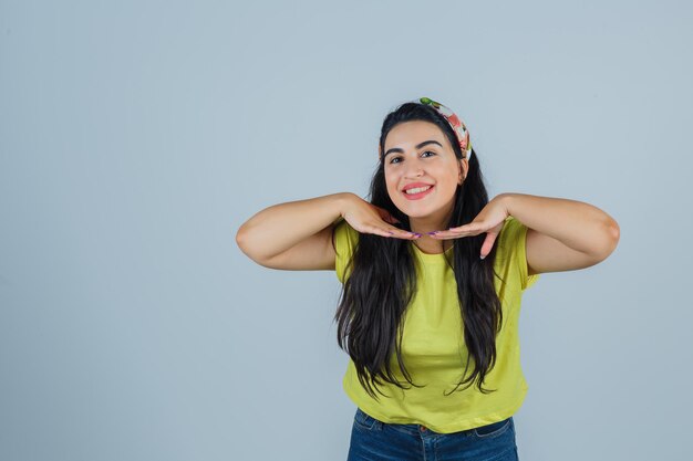 Expressive young lady posing in the studio