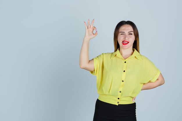 Expressive young lady posing in the studio