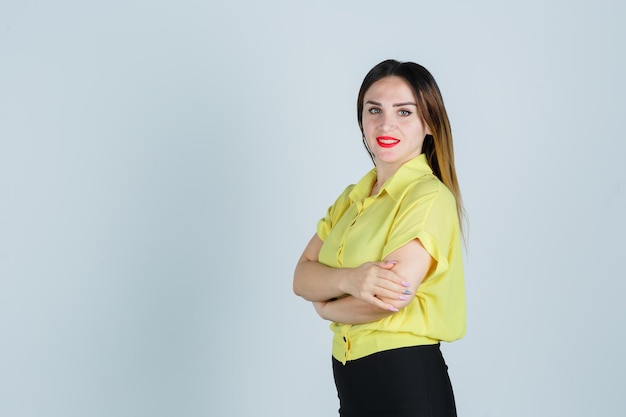 Expressive young lady posing in the studio