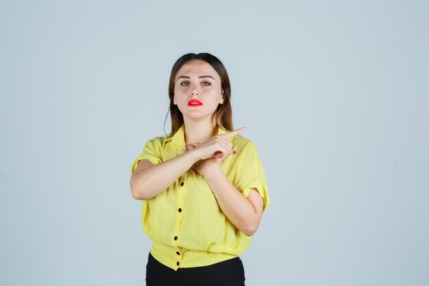 Expressive young lady posing in the studio