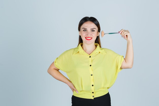 Expressive young lady posing in the studio