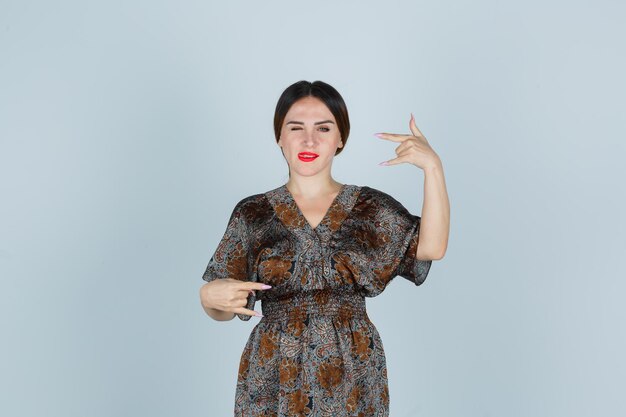 Expressive young lady posing in the studio