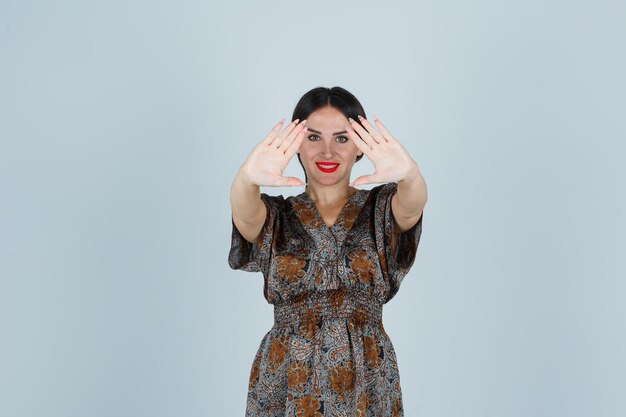 Expressive young lady posing in the studio