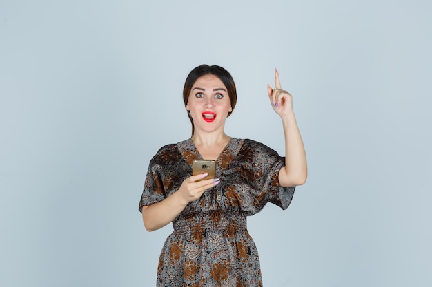 Expressive young lady posing in the studio