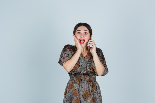 Expressive young lady posing in the studio