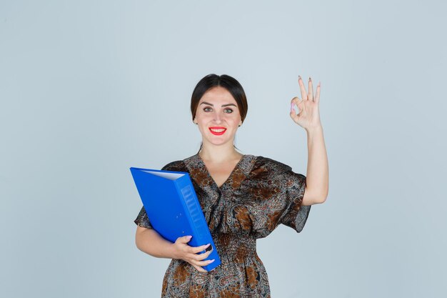 Expressive young lady posing in the studio