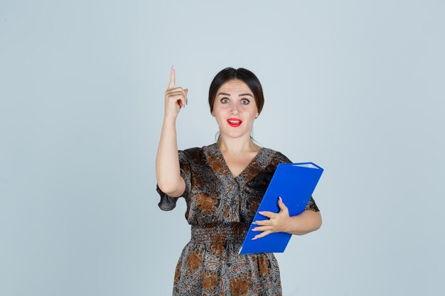 Expressive young lady posing in the studio