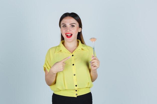 Expressive young lady posing in the studio