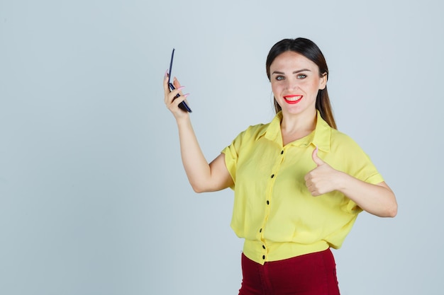 Expressive young lady posing in the studio