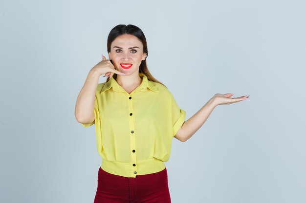 Expressive young lady posing in the studio