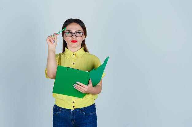 Expressive young lady posing in the studio