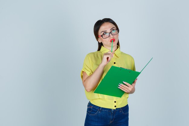 Expressive young lady posing in the studio