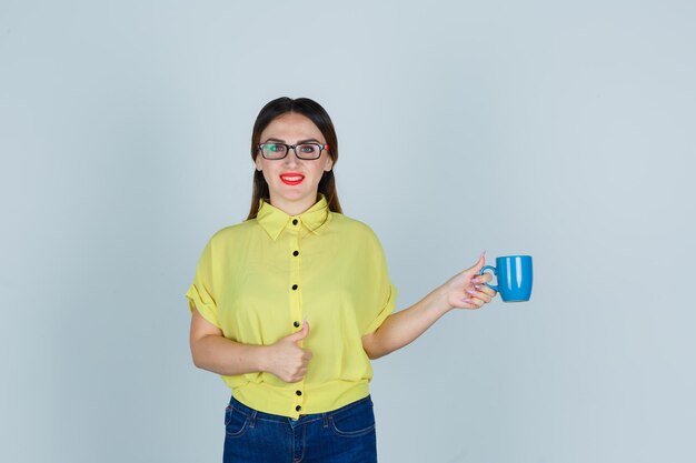 Expressive young lady posing in the studio