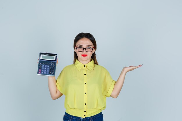 Expressive young lady posing in the studio