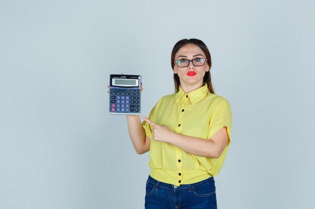 Expressive young lady posing in the studio