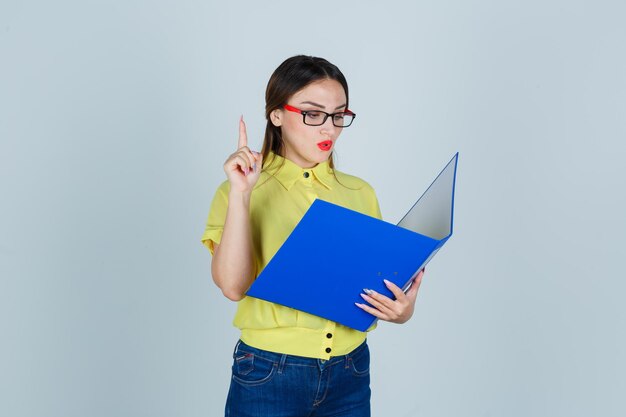 Expressive young lady posing in the studio