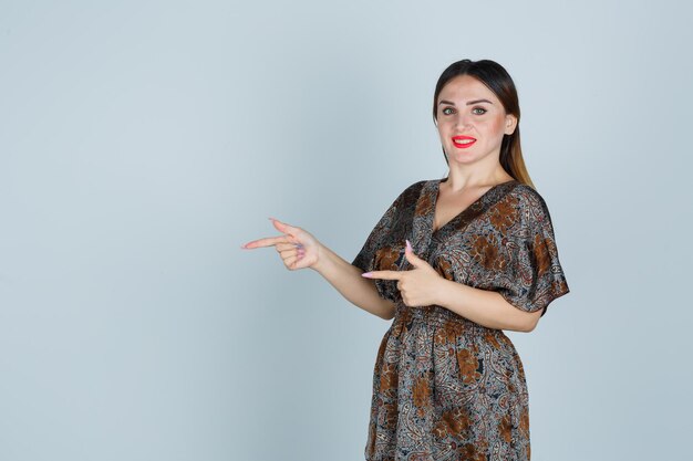 Expressive young lady posing in the studio