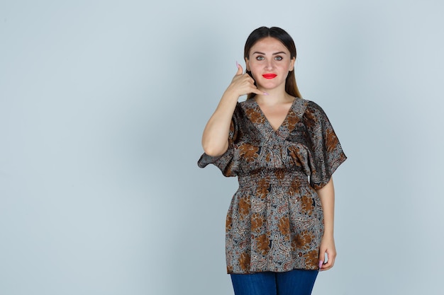 Expressive young lady posing in the studio