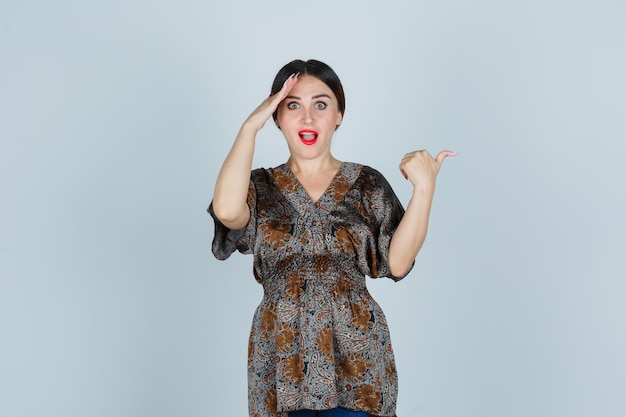 Expressive young lady posing in the studio