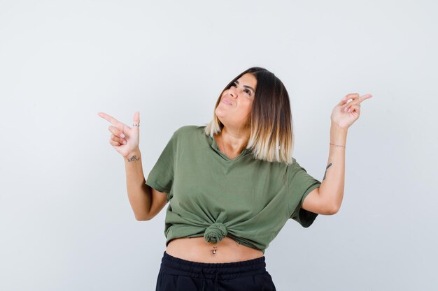 Expressive young lady posing in the studio