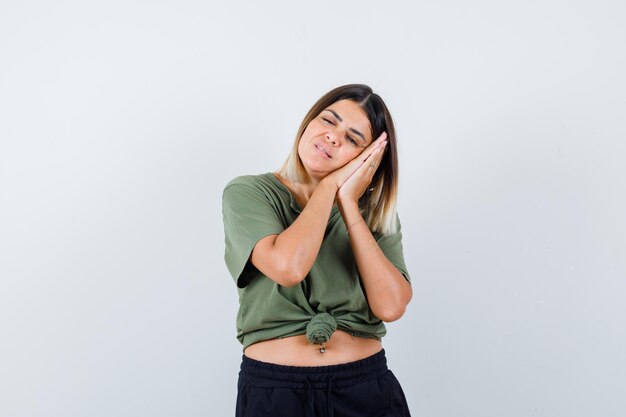 Expressive young lady posing in the studio