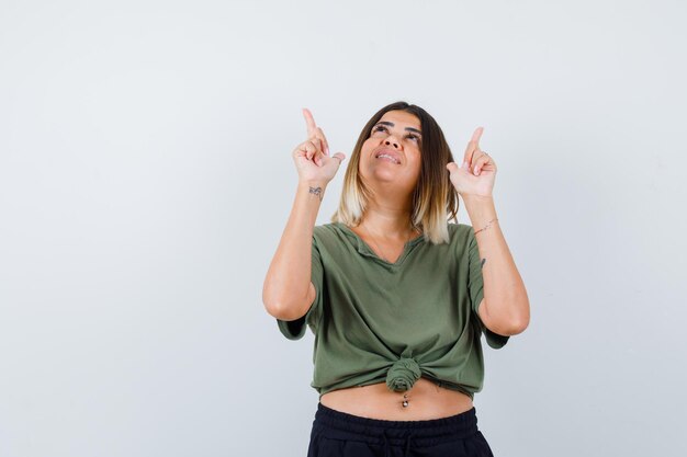 Expressive young lady posing in the studio