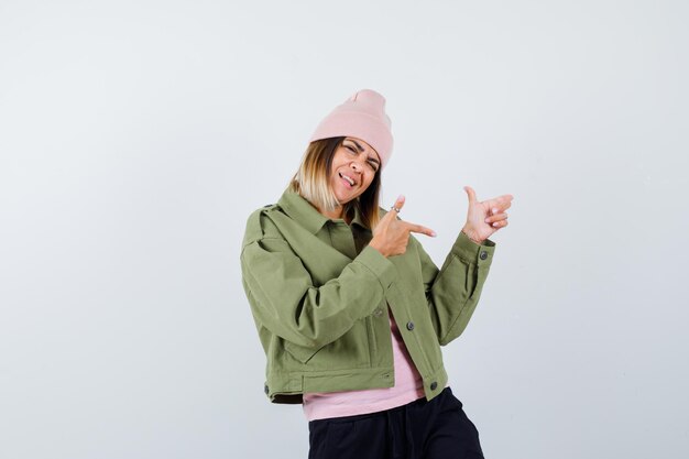 Expressive young lady posing in the studio