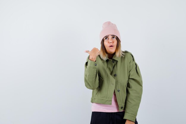 Expressive young lady posing in the studio