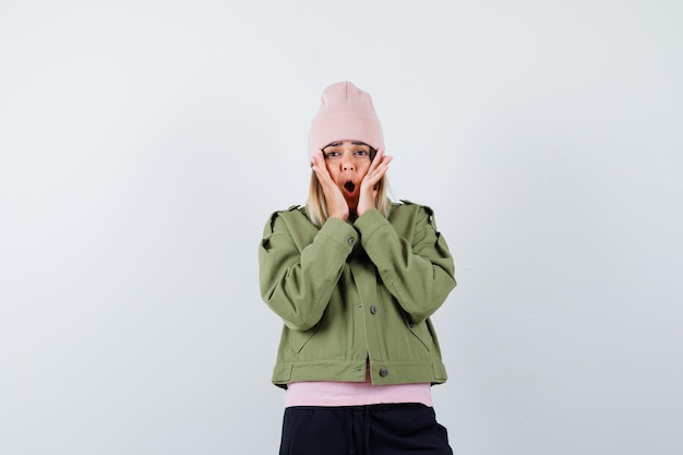 Expressive young lady posing in the studio