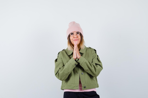 Expressive young lady posing in the studio