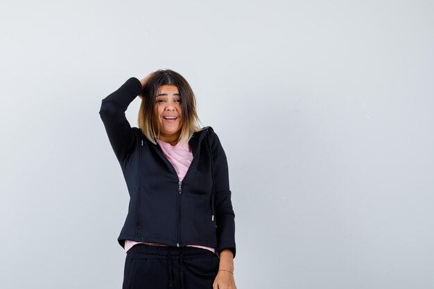 Expressive young lady posing in the studio