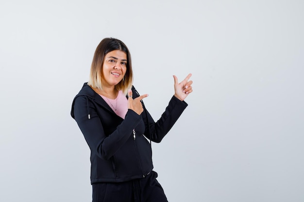 Expressive young lady posing in the studio