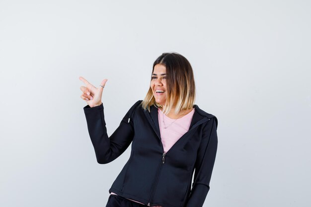 Expressive young lady posing in the studio