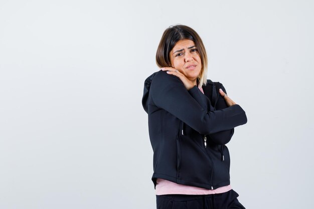 Expressive young lady posing in the studio